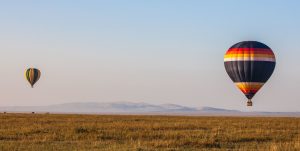 two hot air balloons over mara